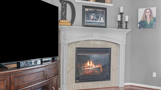 13402 Layton Castle Ln, Cypress, TX 77429 - detailed view of a glass covered fireplace and baseboards