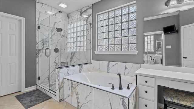 13402 Layton Castle Ln, Cypress, TX 77429 - full bathroom featuring a marble finish shower, a garden tub, vanity, and tile patterned flooring