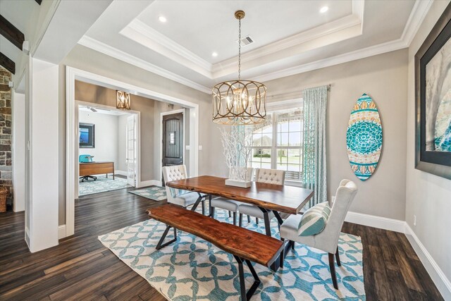 32319 Tall Oaks Way, Magnolia, TX 77354 - dining room featuring dark wood-style floors, a chandelier, baseboards, and ornamental molding