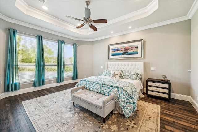32319 Tall Oaks Way, Magnolia, TX 77354 - bedroom with a tray ceiling, wood finished floors, crown molding, baseboards, and ceiling fan