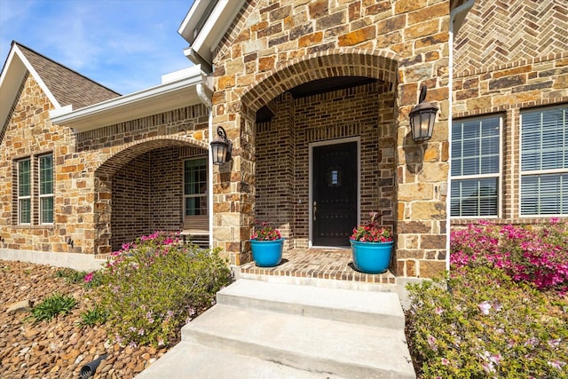 32319 Tall Oaks Way, Magnolia, TX 77354 - doorway to property with brick siding and stone siding