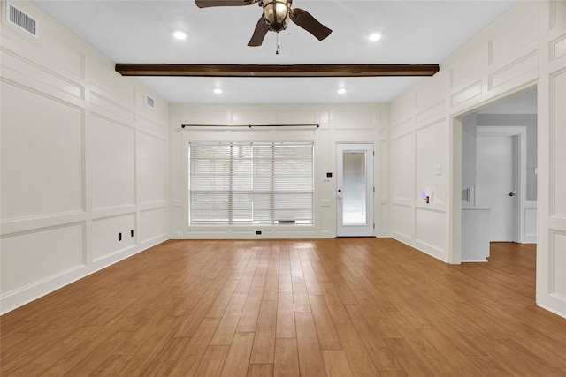 6214 Oak Masters Dr, Spring, TX 77379 - unfurnished room with a decorative wall, beamed ceiling, ceiling fan, and light wood finished floors