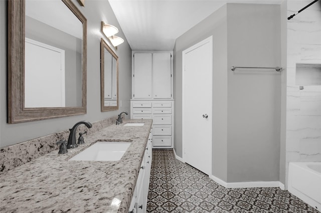 6214 Oak Masters Dr, Spring, TX 77379 - bathroom with baseboards and double vanity