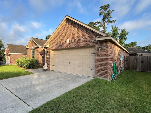 969 Gowan Dr, Conroe, TX 77301 - ranch-style house featuring brick siding, a garage, driveway, and a shingled roof