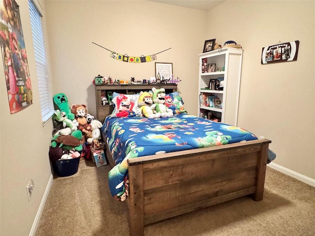 969 Gowan Dr, Conroe, TX 77301 - carpeted bedroom featuring baseboards