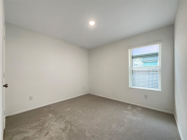 20011 Epirus Shores Dr, Hockley, TX 77447 - carpeted empty room featuring baseboards