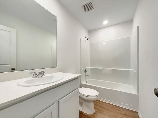 20011 Epirus Shores Dr, Hockley, TX 77447 - full bathroom featuring wood finished floors, shower / bathtub combination, toilet, and vanity