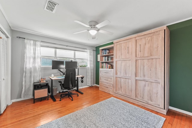 10438 Brinwood Dr, Houston, TX 77043 - office featuring a ceiling fan, wood finished floors, crown molding, and baseboards