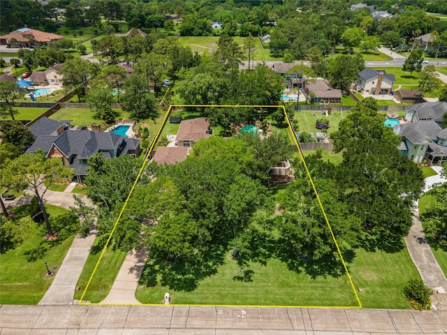 aerial perspective of suburban area with property parcel outlined