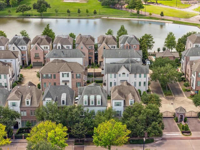 1206 Lake Pointe Pkwy, Sugar Land, TX 77478 - aerial view of residential area featuring a nearby body of water