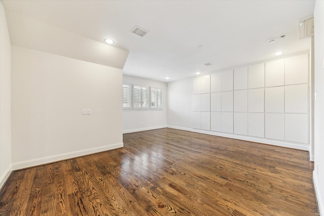 1206 Lake Pointe Pkwy, Sugar Land, TX 77478 - unfurnished room featuring dark wood-type flooring, baseboards, and recessed lighting