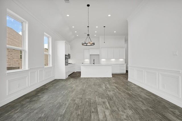 400 Little Spring Ct, Anahuac, TX 77514 - unfurnished living room featuring ornamental molding, a chandelier, dark wood-type flooring, a sink, and recessed lighting