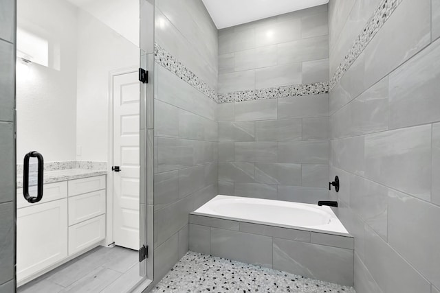 400 Little Spring Ct, Anahuac, TX 77514 - bathroom featuring a tub and a shower