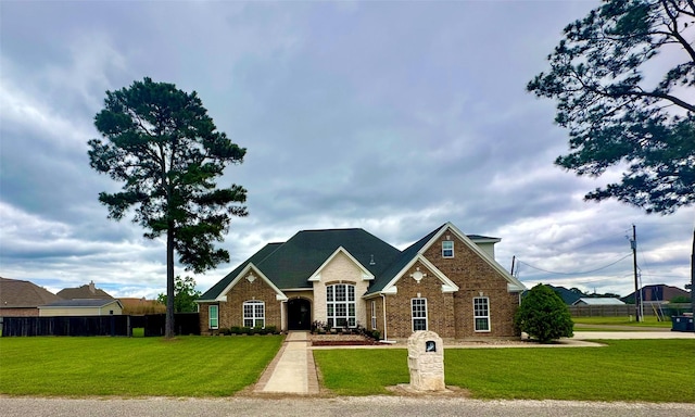 305 Tyler Dr, Bridge City, TX 77630 - traditional-style home with brick siding