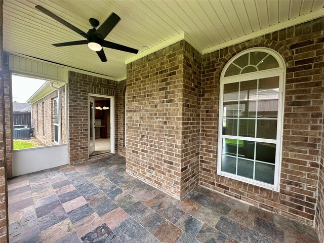 305 Tyler Dr, Bridge City, TX 77630 - view of patio featuring a ceiling fan and central AC