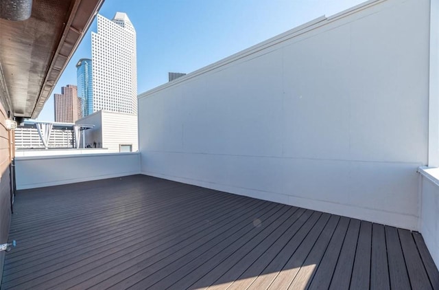 730 Ruthven, Houston, TX 77019 - wooden deck featuring a skyline view