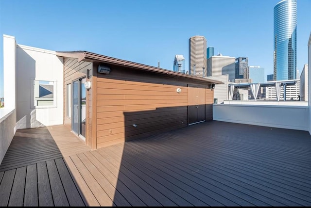 730 Ruthven, Houston, TX 77019 - wooden deck featuring a view of skyline