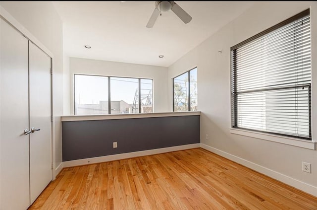 730 Ruthven, Houston, TX 77019 - unfurnished bedroom featuring baseboards, light wood-style floors, a closet, and a ceiling fan