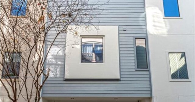 730 Ruthven, Houston, TX 77019 - view of home's exterior with fence