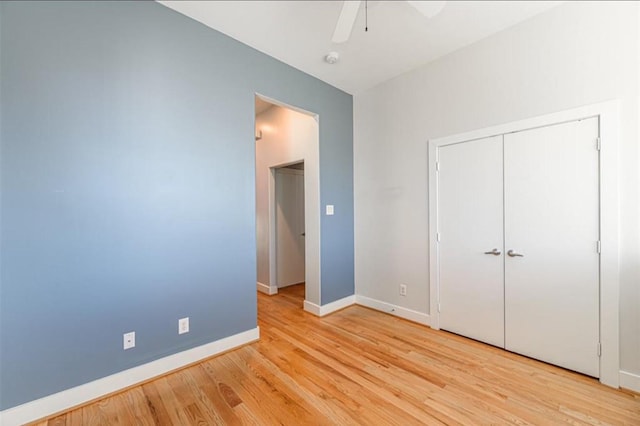 730 Ruthven, Houston, TX 77019 - unfurnished bedroom with light wood finished floors, baseboards, a closet, and a ceiling fan