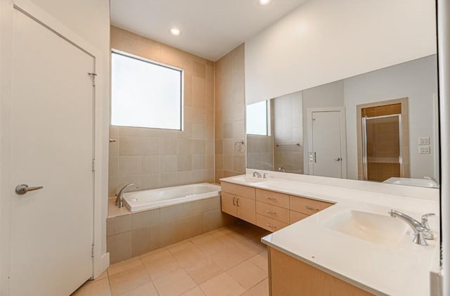 730 Ruthven, Houston, TX 77019 - full bath featuring a bath, a shower stall, double vanity, tile patterned floors, and recessed lighting