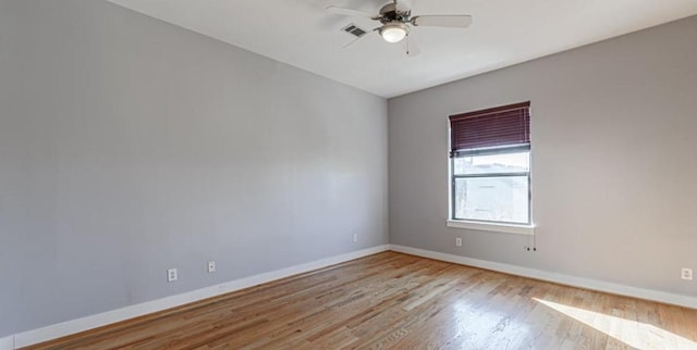 730 Ruthven, Houston, TX 77019 - empty room featuring wood finished floors, baseboards, and ceiling fan