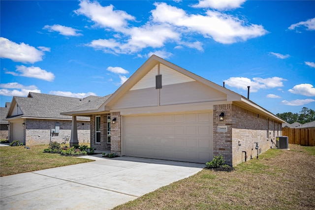 20068 Swinley Forest Dr, Cleveland, TX 77327 - view of front of house featuring a garage, concrete driveway, brick siding, and central AC unit