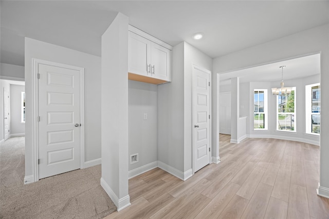 20068 Swinley Forest Dr, Cleveland, TX 77327 - mudroom with a chandelier, baseboards, light wood-style floors, and recessed lighting