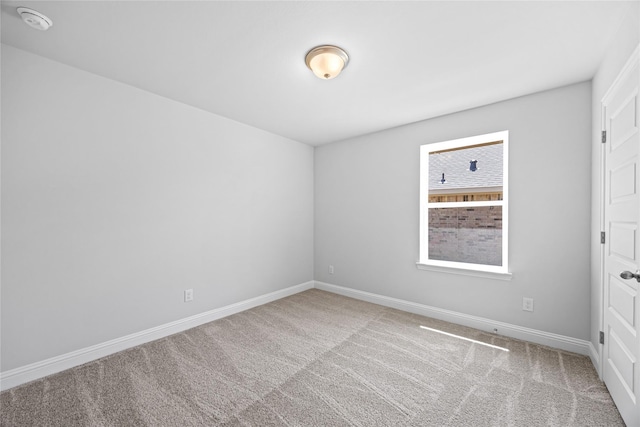 20068 Swinley Forest Dr, Cleveland, TX 77327 - carpeted spare room with baseboards and a smoke detector