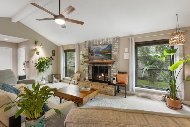 carpeted living room featuring a ceiling fan and a brick fireplace