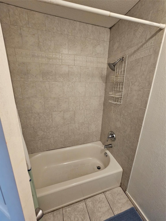 1100 Augusta Dr Unit 42, Houston, TX 77057 - bathroom with tile patterned flooring and shower / tub combo with curtain