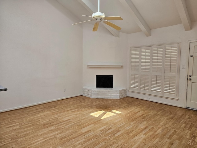 1100 Augusta Dr Unit 42, Houston, TX 77057 - unfurnished living room featuring wood finished floors, a fireplace, a ceiling fan, and baseboards