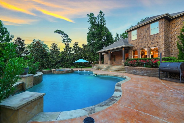 5523 Harvest Oak Landing Dr, Spring, TX 77386 - view of pool featuring a patio, a pool with connected hot tub, and a grill