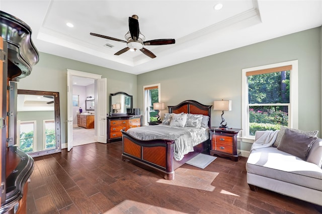 5523 Harvest Oak Landing Dr, Spring, TX 77386 - bedroom with a tray ceiling, recessed lighting, dark wood finished floors, multiple windows, and ornamental molding