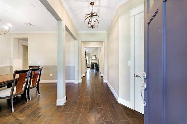 5523 Harvest Oak Landing Dr, Spring, TX 77386 - foyer with a chandelier, baseboards, dark wood finished floors, and ornamental molding