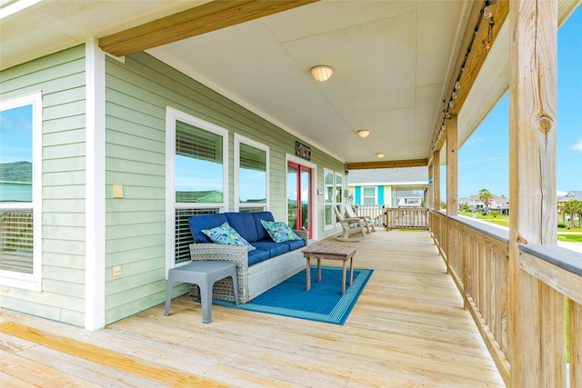 4126 Grayson Dr, Galveston, TX 77554 - deck featuring an outdoor living space and covered porch