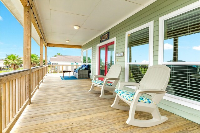 4126 Grayson Dr, Galveston, TX 77554 - deck with a porch