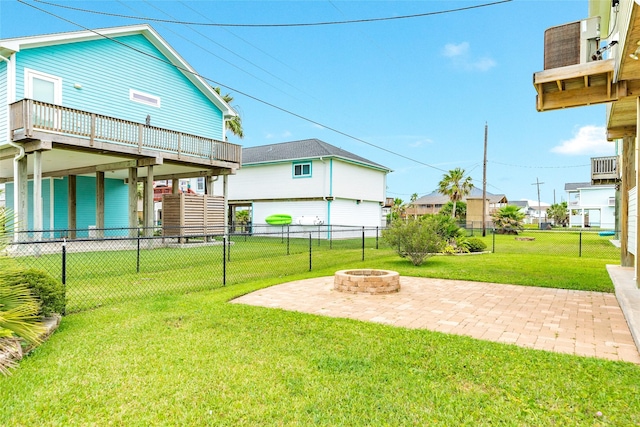 4126 Grayson Dr, Galveston, TX 77554 - view of yard with an outdoor fire pit, a patio area, and a residential view