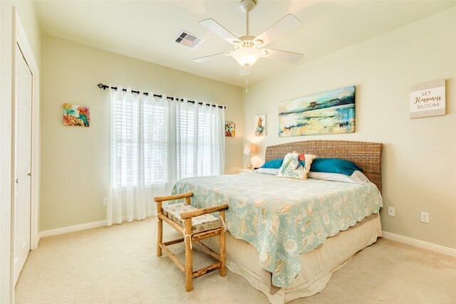 4126 Grayson Dr, Galveston, TX 77554 - carpeted bedroom with baseboards, a ceiling fan, and a closet