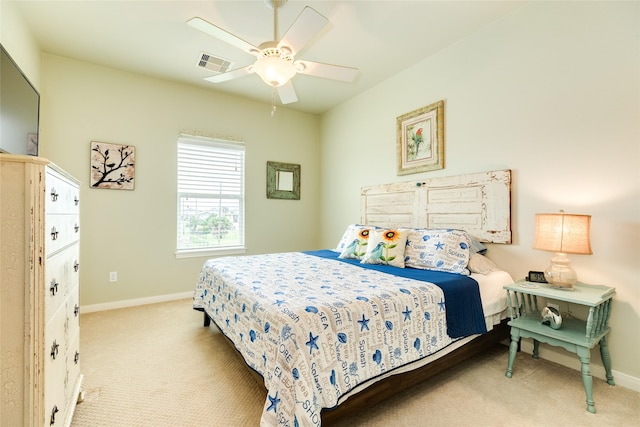 4126 Grayson Dr, Galveston, TX 77554 - bedroom with carpet floors, baseboards, and ceiling fan