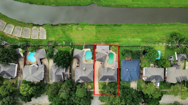 view of property location with a pool and property boundaries highlighted