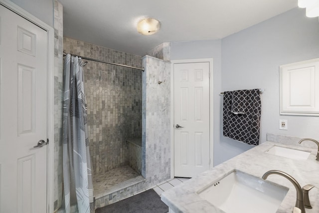 17310 Chaseloch St, Spring, TX 77379 - full bath featuring tiled shower, tile patterned floors, and double vanity