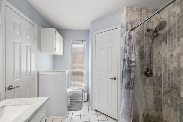 17310 Chaseloch St, Spring, TX 77379 - bathroom with a stall shower, tile patterned flooring, toilet, and vanity