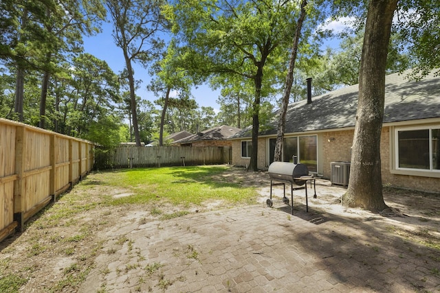 17310 Chaseloch St, Spring, TX 77379 - view of yard with central air condition unit and a patio