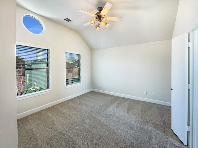 3701 Main Plaza Dr, Houston, TX 77025 - carpeted spare room featuring vaulted ceiling, ceiling fan, and baseboards