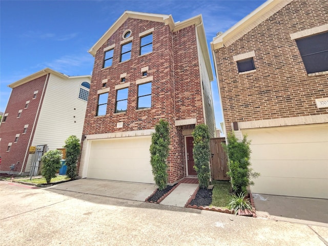3701 Main Plaza Dr, Houston, TX 77025 - view of front of house featuring a garage, brick siding, and concrete driveway