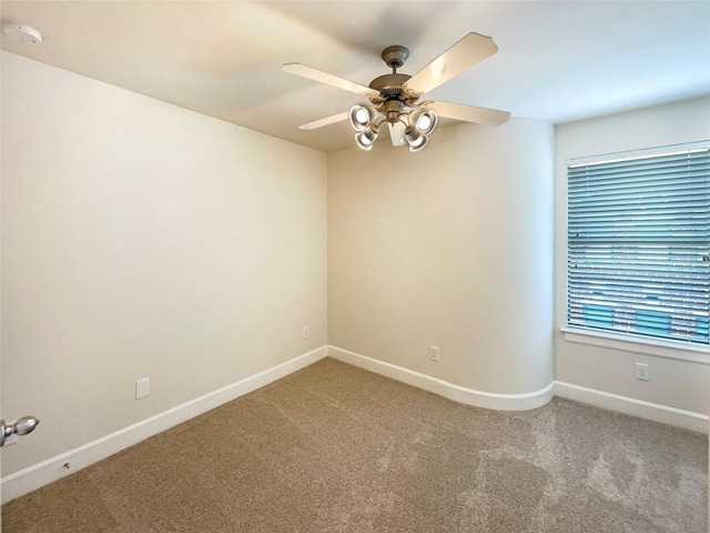 3701 Main Plaza Dr, Houston, TX 77025 - unfurnished room featuring a smoke detector, light colored carpet, baseboards, and a ceiling fan
