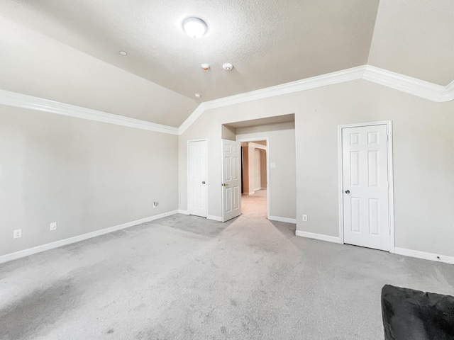 5715 Ladonia St, Arcola, TX 77583 - bonus room featuring vaulted ceiling, carpet floors, and baseboards
