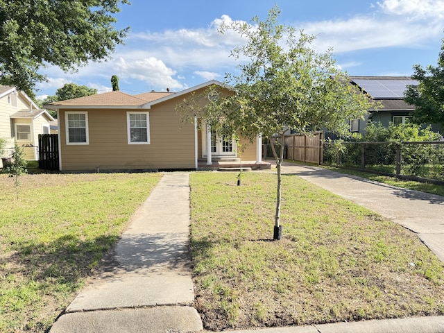 216 Gale St, Houston, TX 77009 - view of front facade featuring concrete driveway and french doors