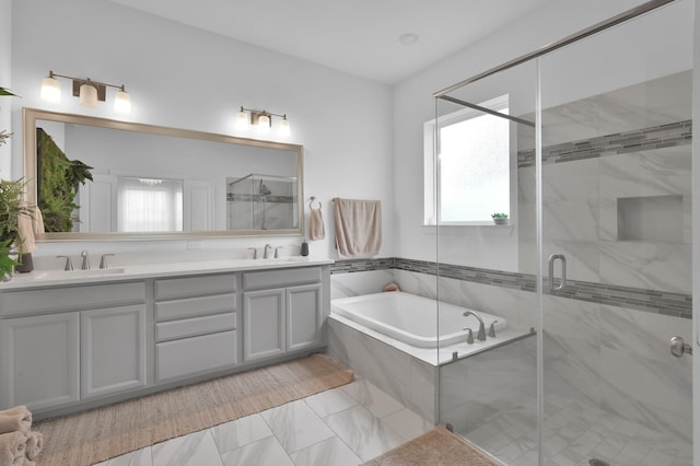 2807 Kingly Pine Trl, Conroe, TX 77385 - full bath featuring a bath, a stall shower, and double vanity